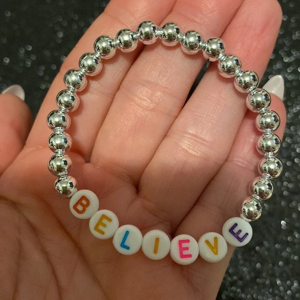 Girls faux silver beaded stretch believe bracelet
